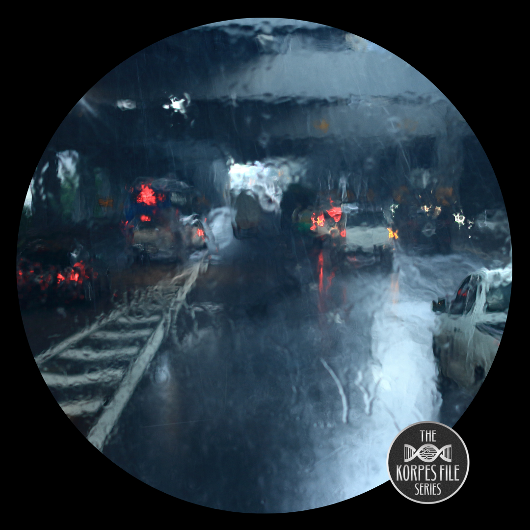 heavy rain on windshield as vehicle drives into busy tunnel.
